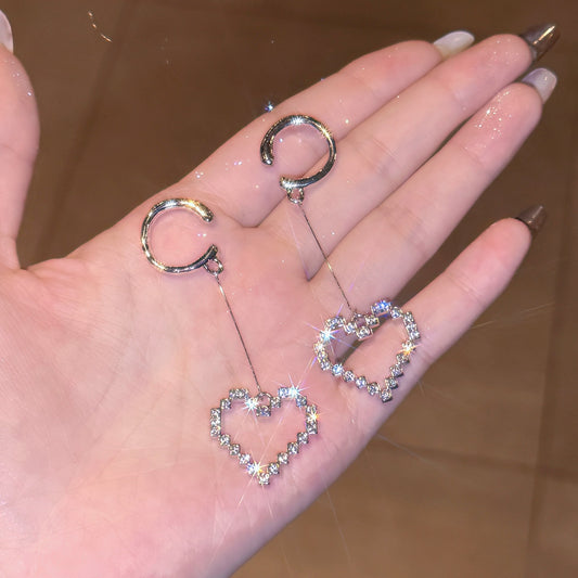 Elegantes Herz-Ohrclip – Ausgestochenes Muster voller Steine für Ohren ohne Piercing